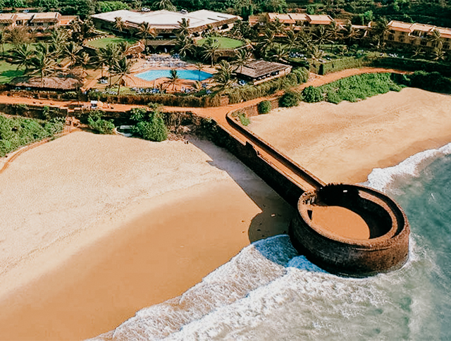 Aerial view of Aguada Fort in Goa overlooking the Arabian Sea.