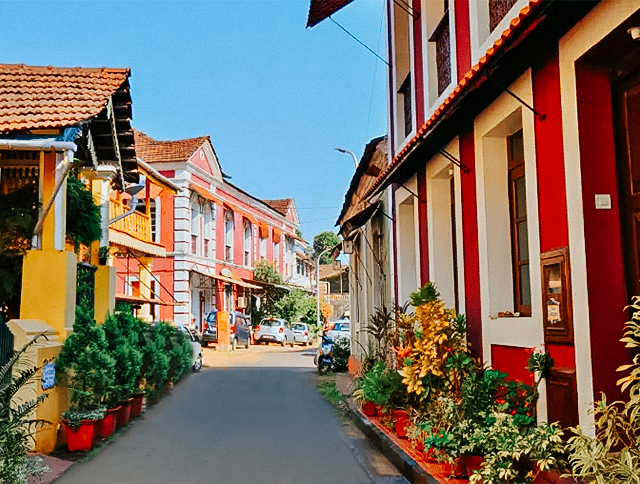 A charming street in Fontainhas, Goa, lined with colorful Portuguese-style houses.