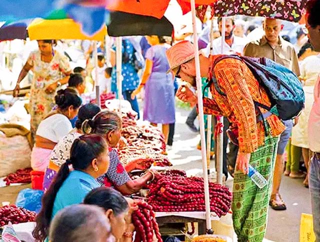 Colorful stalls at Mapusa Market in Goa, India.